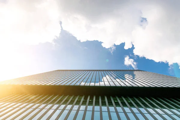 Companies buildings. Finance corporate architecture city in abstract blue sky with nature cloud in sunny day. Modern office business building with glass, steel facade exterior