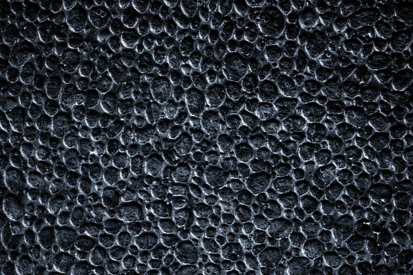 Polystyrene texture. Grey styrofoam foam material or white plastic pattern. Gray wall for board background. Blackboard wallpaper