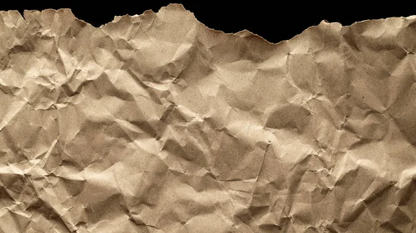 Rustic paper torn. Torn kraft paper texture background. Old craft vintage cardboard isolated on black with clipping path