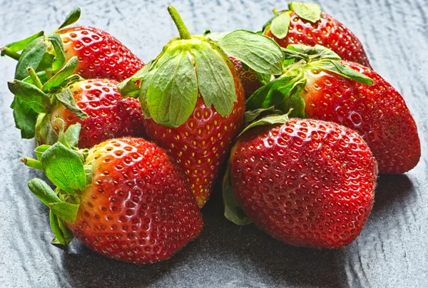 Strawberries on black background — Stock Photo, Image