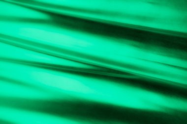 Soyut arka plan lüks kumaş veya sıvı dalga veya grunge ipek kumaş kıvrımlı saten kadife kumaş veya lüks