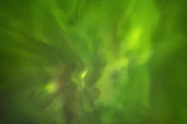 Beautiful northern lights aurora borealis against the background of the starry sky. — Stock Photo, Image