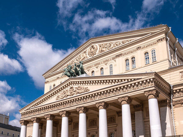 Daylight view of the Bolshoi Theater in Moscow, Russia. Bolshoi Theater on blue sky background