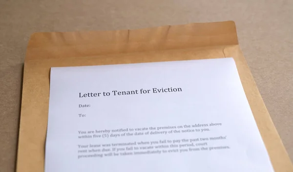 Letter Tenant Eviction Open Brown Envelope — Stock Photo, Image