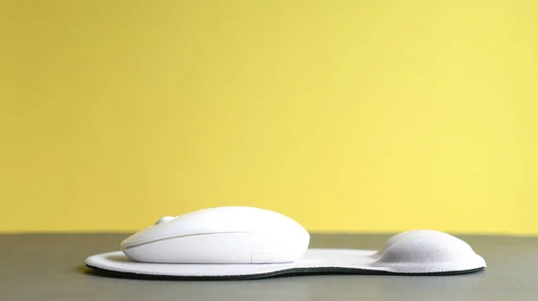 Wireless mouse and mouse pad with wrist rest. Isolated.