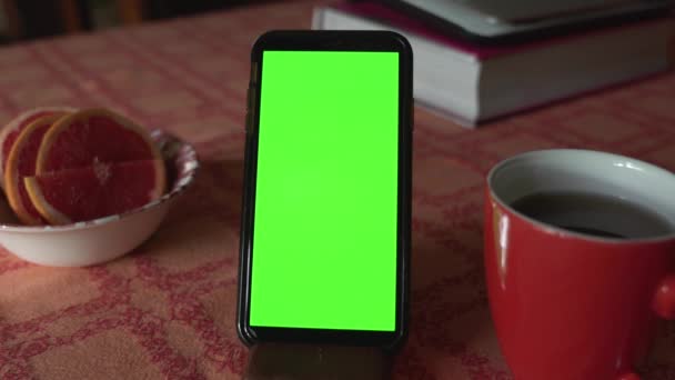 Mobile Phone Green Screen Stands Dining Table Next Cup Coffee — Stockvideo