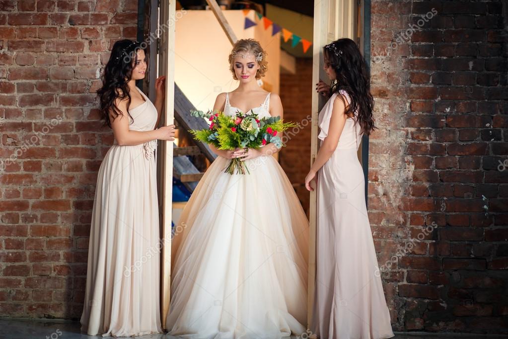 Beautiful Blonde Bride In Luxury Wedding Dress And Pretty Twins