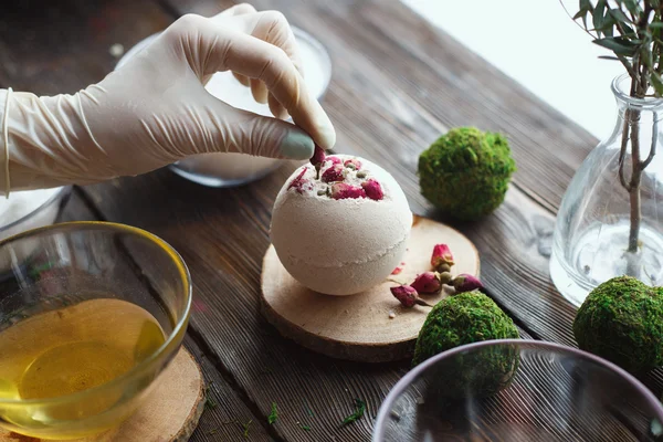 Preparation of bath bombs. Ingredients and floral decor on a wooden vintage table. — Stock Photo, Image