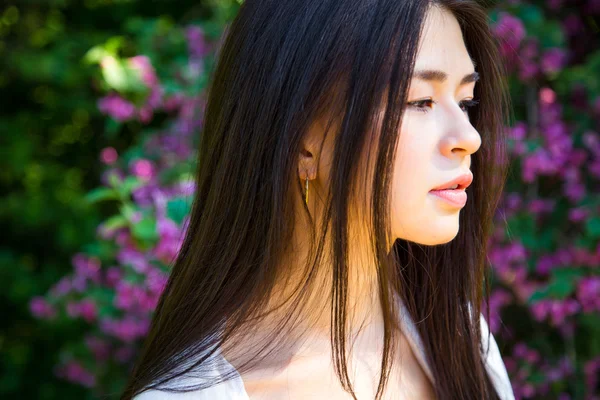 Beautiful asian young woman resting on nature