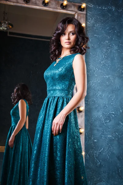 Portrait of beautiful elegant young woman in gorgeous evening dress — Stock Photo, Image