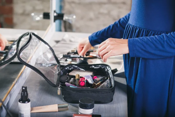 Makeup artist and her workplace. Woman and cosmetics. — Stock Photo, Image