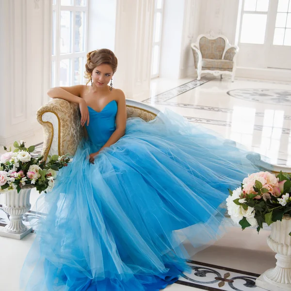 Beautiful bride in gorgeous blue dress Cinderella style in a morning — Stock Photo, Image