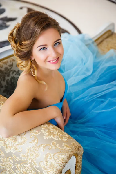 Beautiful bride in gorgeous blue dress Cinderella style in a morning — Stock Photo, Image