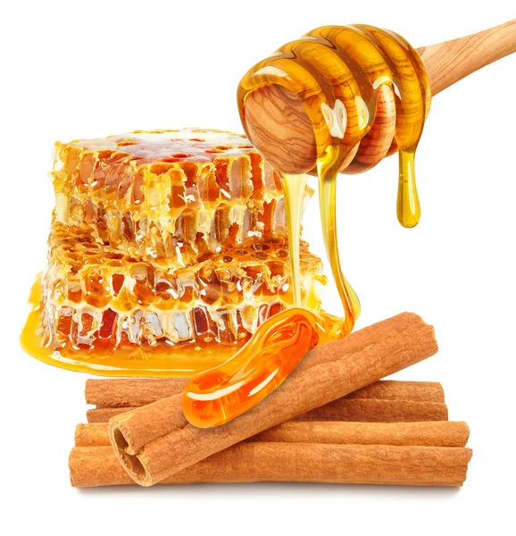 Canela e favo de mel — Fotografia de Stock