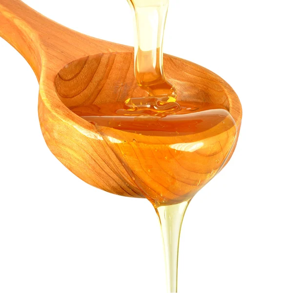 Dripping honey — Stock Photo, Image