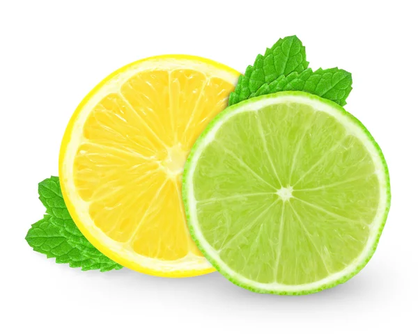 Лимон с ломтиком лайма и мятой — стоковое фото