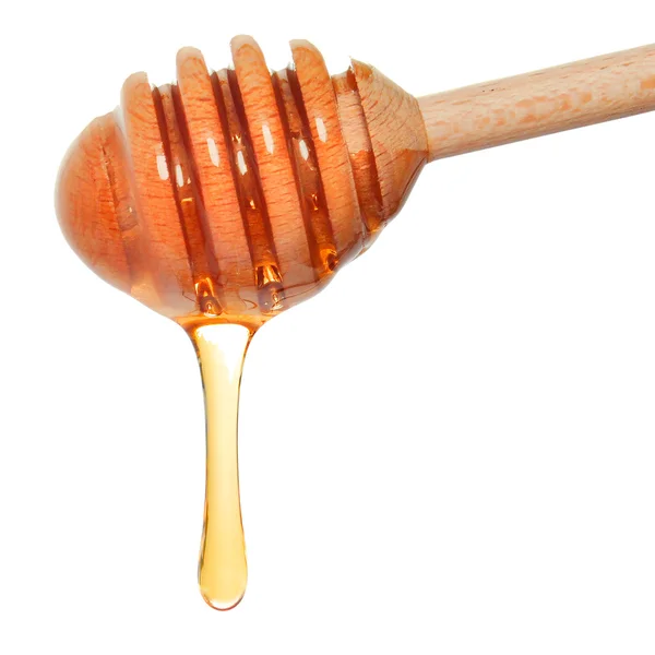 Dripping honey — Stock Photo, Image