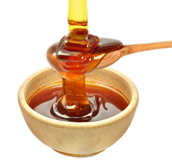 Honey dripping Stock Photo