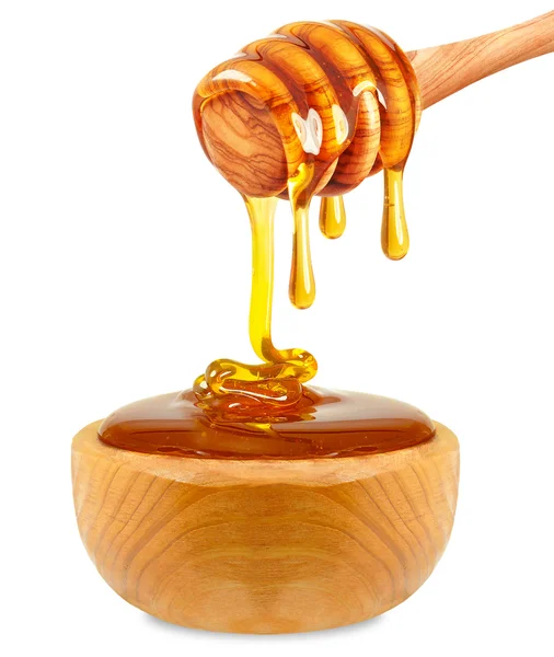 Honung i en skål — Stockfoto