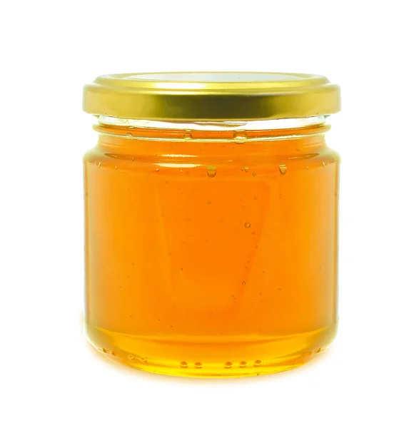 Honung i en burk — Stockfoto