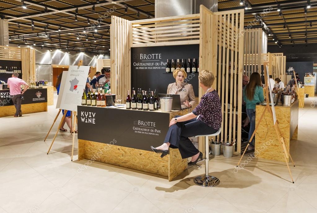 KIEV, UKRAINE - June 04, 2016: Unrecognized people visit booth Chateau Brotte wine from France at Kyiv Wine Festival organized by Good Wine company in Parkovy Exhibition Center.