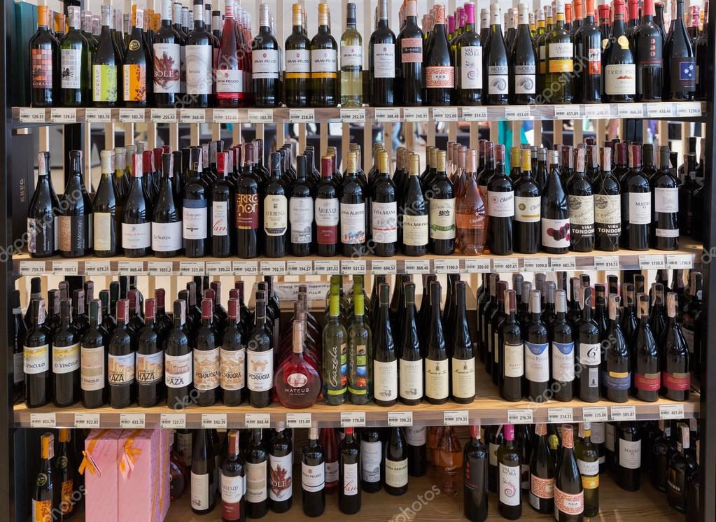 KIEV, UKRAINE - JUNE 04, 2016: Wine from different manufacturers closeup presented on the store shelves at Kyiv Wine Festival organized by Good Wine company in Parkovy Exhibition Center.