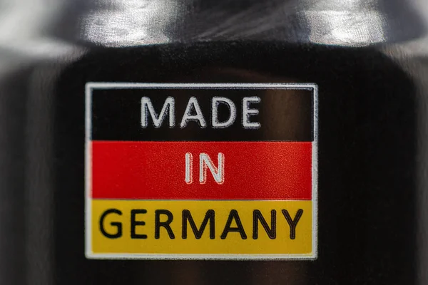 Die Deutschland Gefertigte Inschrift Auf Dem Hintergrund Der Farben Der — Stockfoto