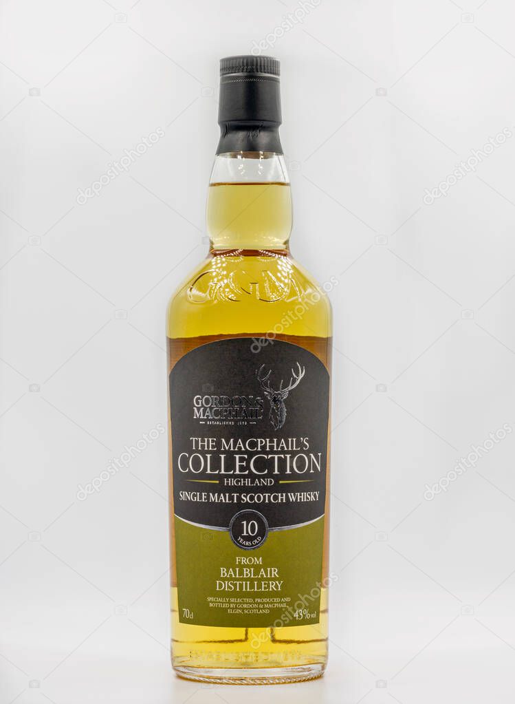 KYIV, UKRAINE - DECEMBER 17, 2020: Studio shoot of The Macphails Collection Highland Single Malt Scotch 10 years old whisky bottle closeup against white. From Balblair Distillery.