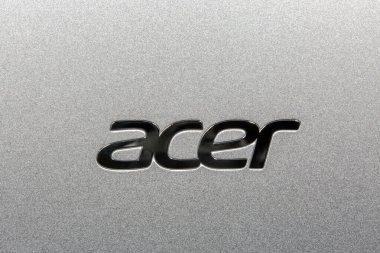 KIEV, UKRAINE - MARCH 02, 2021: Acer logo closeup on laptope metal surface. Acer is a Taiwan based international computer company. clipart