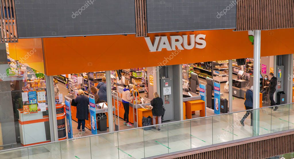 KYIV, UKRAINE - APRIL 22, 2021: People visit Varus supermarket. VARUS is included in the TOP-10 retail chains of Ukraine in terms of turnover.