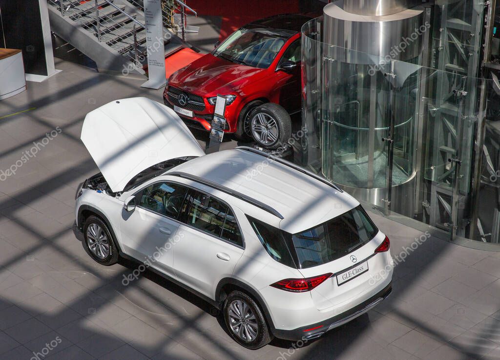 KYIV, UKRAINE - MAY 10, 2021: New cars indoors on display in Mercedes-Benz Automotive Center dealership company, view from above.