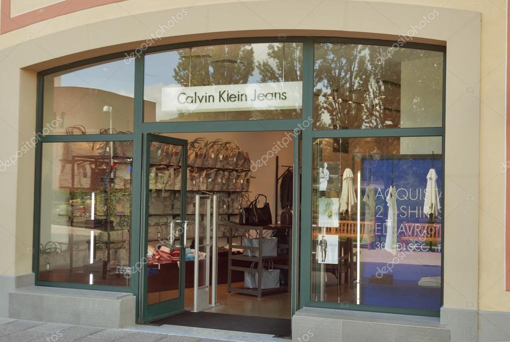 MUGELLO, ITALY - SEPTEMBER 11, 2014: Facade of Calvin Klein Jeans store in McArthurGlen Designer Outlet Barberino situated in 30 minutes from Florence. McArthurGlen Group opened its first designer outlet in 1995.