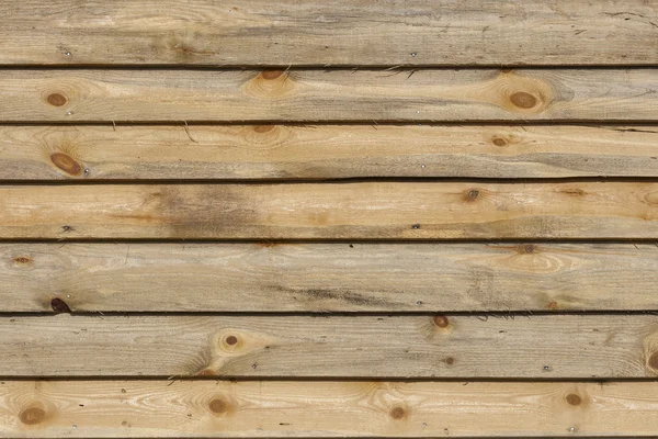 Gehobelte Holzbretter Oberflächenstruktur mit Ästen Hintergrund — Stockfoto