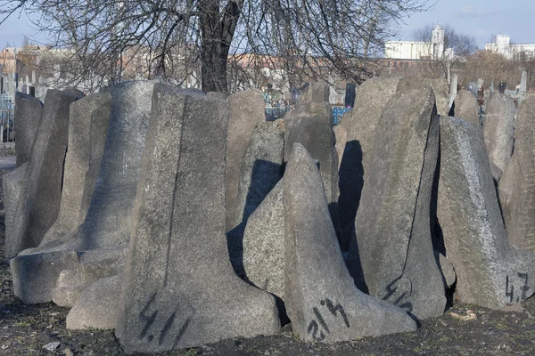 Fallen gravestones of ancient Jewish cemetery in Berdychiv, Ukraine — Stock Photo, Image