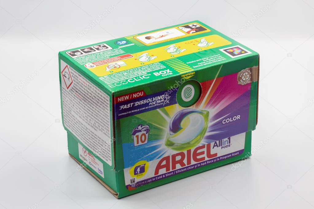 Kyiv, Ukraine - December 31, 2024: Ariel Pods color washing capsules box with two pods displayed. Fast dissolving laundry detergent for colored garments, 10 wash package with recyclable design.