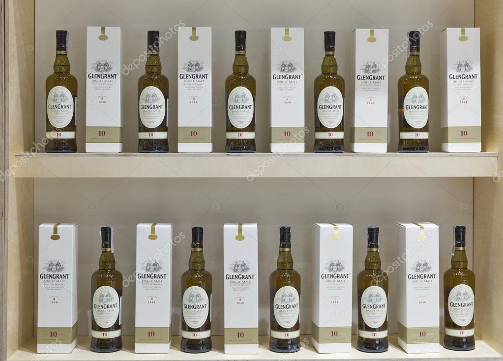 KIEV, UKRAINE - NOVEMBER 21, 2015: Glen Grant Speyside  Single Malt Scotch Whisky bottles closeup in a row for tasting on booth at 1st Ukrainian Whisky Dram Festival in Parkovy Exhibition Center.