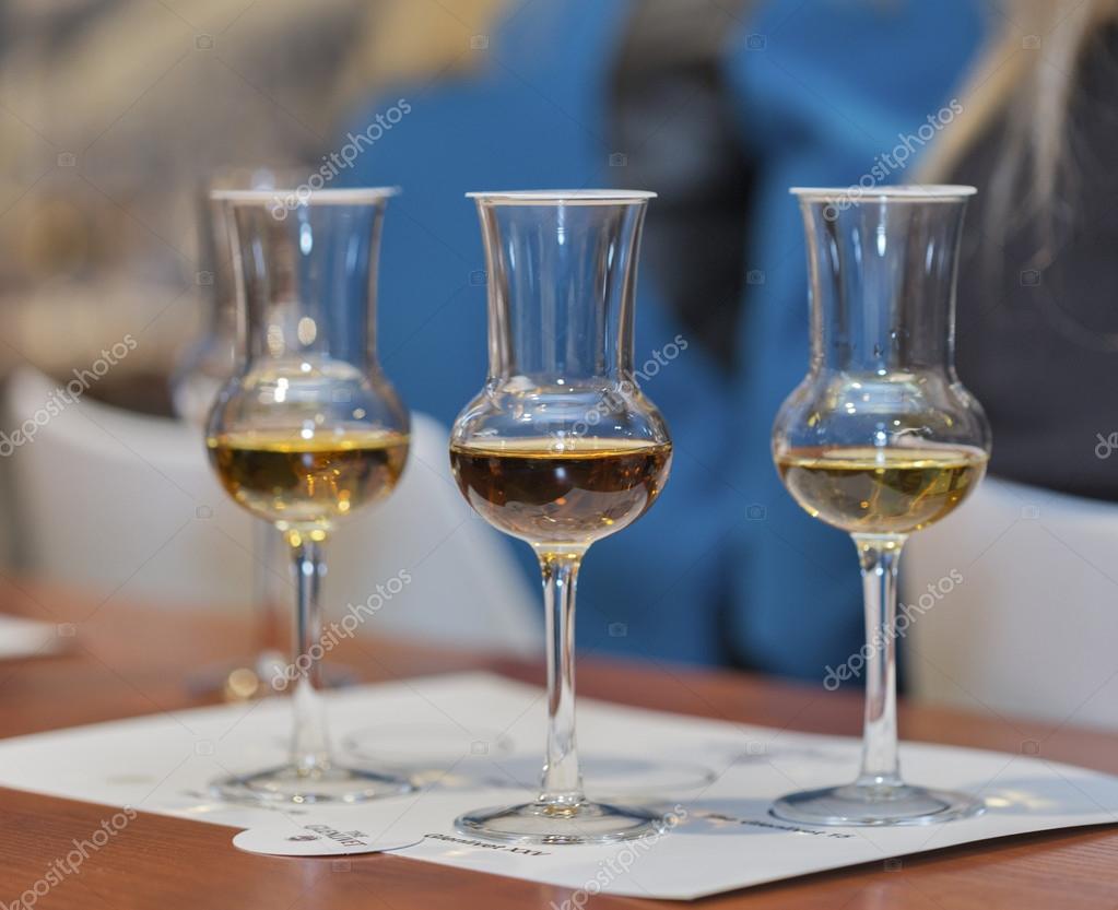 KIEV, UKRAINE - NOVEMBER 21, 2015: Whisky glasses for tasting closeup at corporate presentation of The Glenlivet Single Malt Scotch Whiskey at 1st Whisky Dram Festival in Parkovy Exhibition Center.