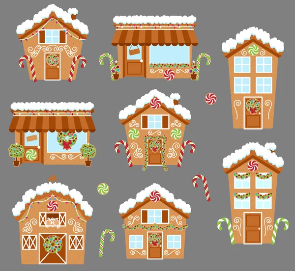 Conjunto de lindas casas de pan de jengibre de vacaciones vectorial, tiendas y otros edificios con nieve — Vector de stock