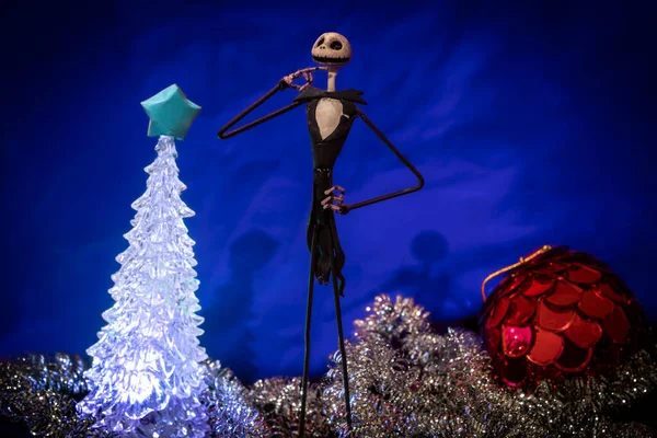 Charming Jack Skellington from Night Before Christmas surrounded by festive adornments in a blue background — Stock Photo, Image