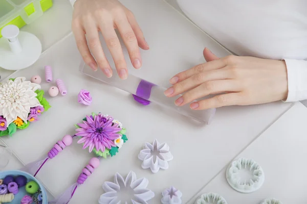 Artist makes jewelry from polymer clay, process. Workshop — Stock Photo, Image