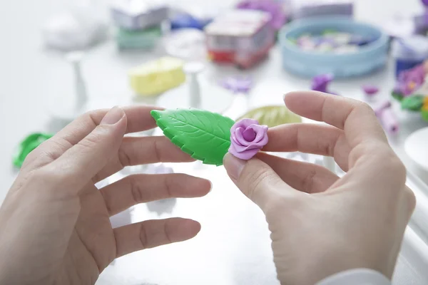 Artist makes jewelry from polymer clay, process. Workshop — Stock Photo, Image