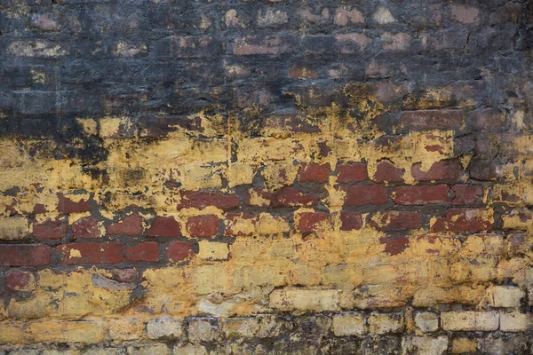 レンガの質感 コンクリートの古代の壁の背景に割れ 古い壁 年齢の粗いレンガ — ストック写真