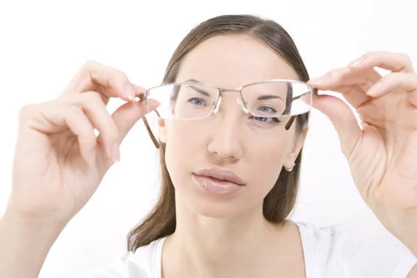 Optics and Glasses, Portrait of young smiling woman looking thro — Stock Photo, Image