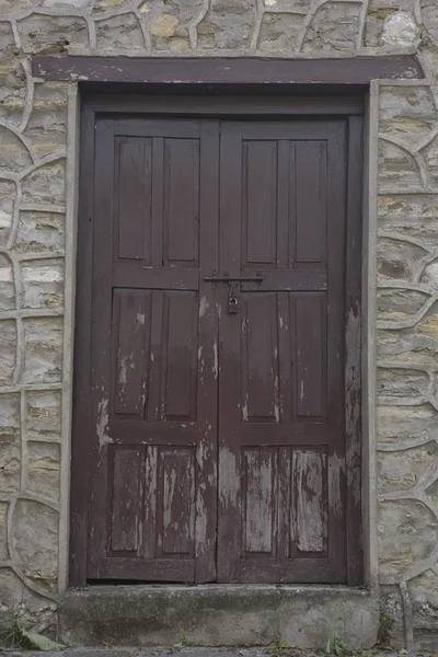 La vieja puerta con pintura agrietada, fondo —  Fotos de Stock