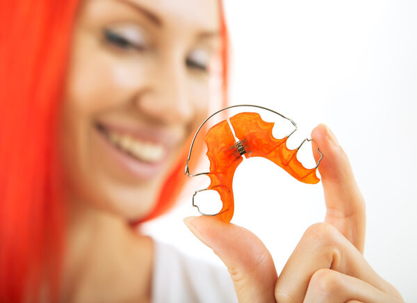 Beautiful Smiling Girl with Retainer for Teeth, Close-up
