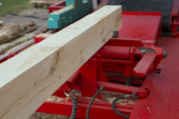 Woodworking the Machine Tool, Wood factory. Wood Shavings, plank — Stock fotografie