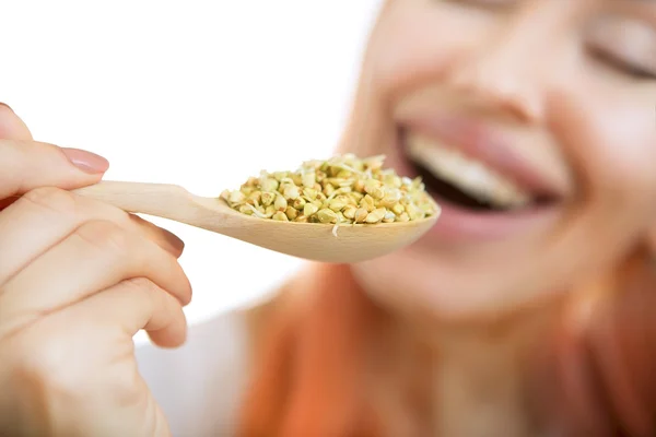 Fresh Green Sprouts Buckwheat closeup. Woman with Sprouts Buckwh — Stock Photo, Image