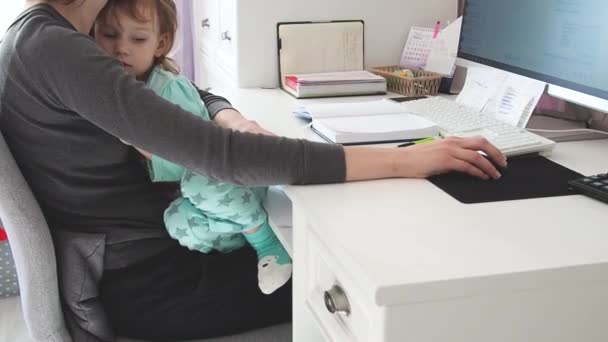 Sad Child Girl Sits Mothers Lap While She Works Online — Stock Video