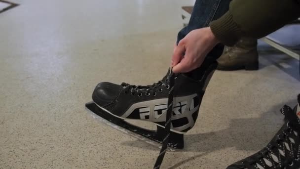 Man Dressing Hockey Skates Ice Skating Locker Room Close Preparation — Stock Video