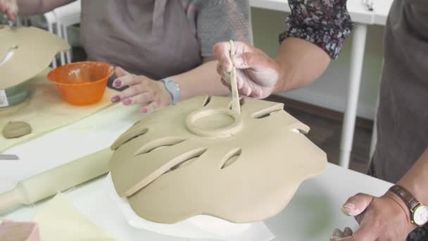 Woman Hand Potter Making Clay Monstera Leaf Pottery Workshop Studio — Stock Video